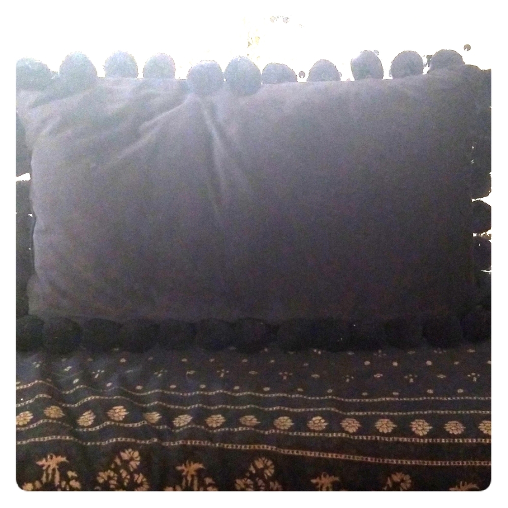 Pom pom pillow